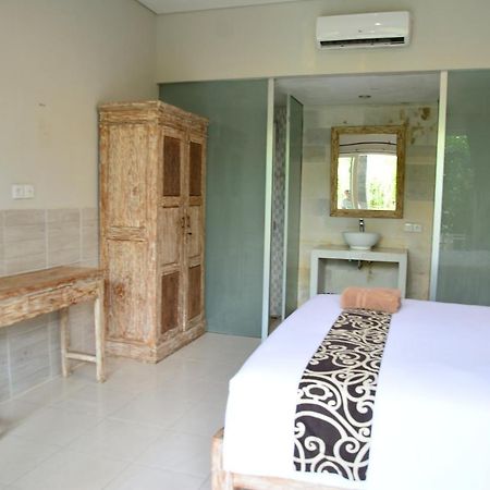 Asung Guesthouse Canggu Extérieur photo