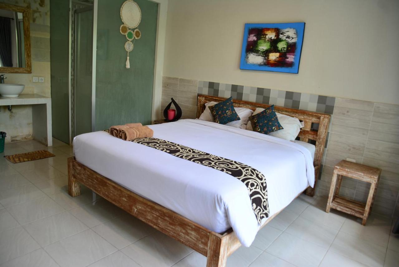 Asung Guesthouse Canggu Extérieur photo