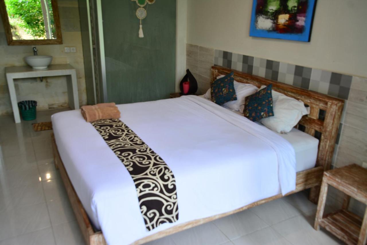 Asung Guesthouse Canggu Extérieur photo