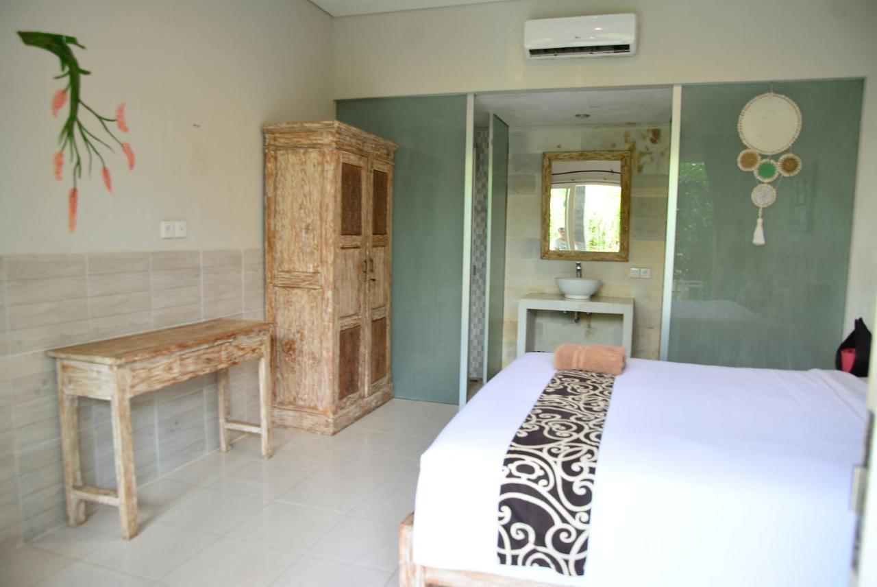 Asung Guesthouse Canggu Extérieur photo