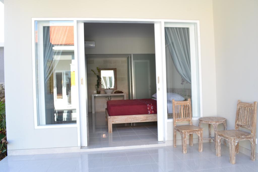 Asung Guesthouse Canggu Extérieur photo