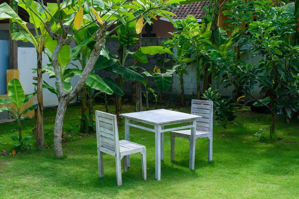 Asung Guesthouse Canggu Extérieur photo