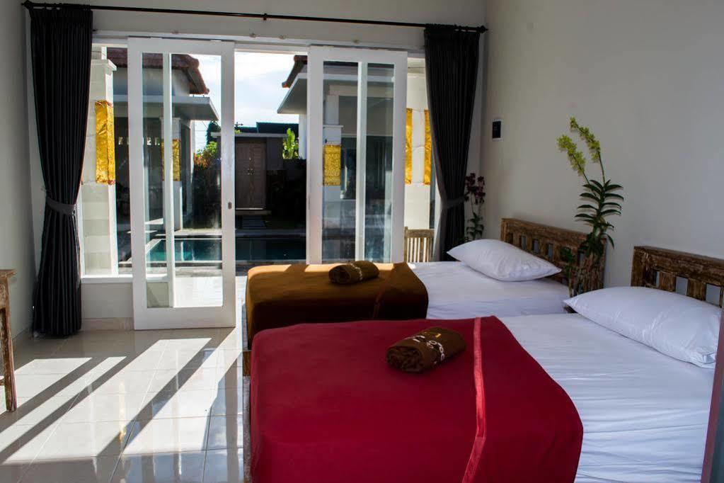 Asung Guesthouse Canggu Extérieur photo